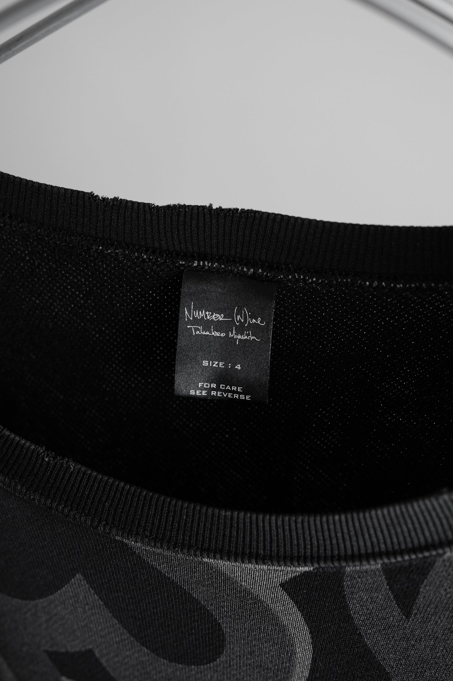 Number (N)ine F/W2004 “Give Peace a Chance” - Tribal Heart Camo Sweatshirt