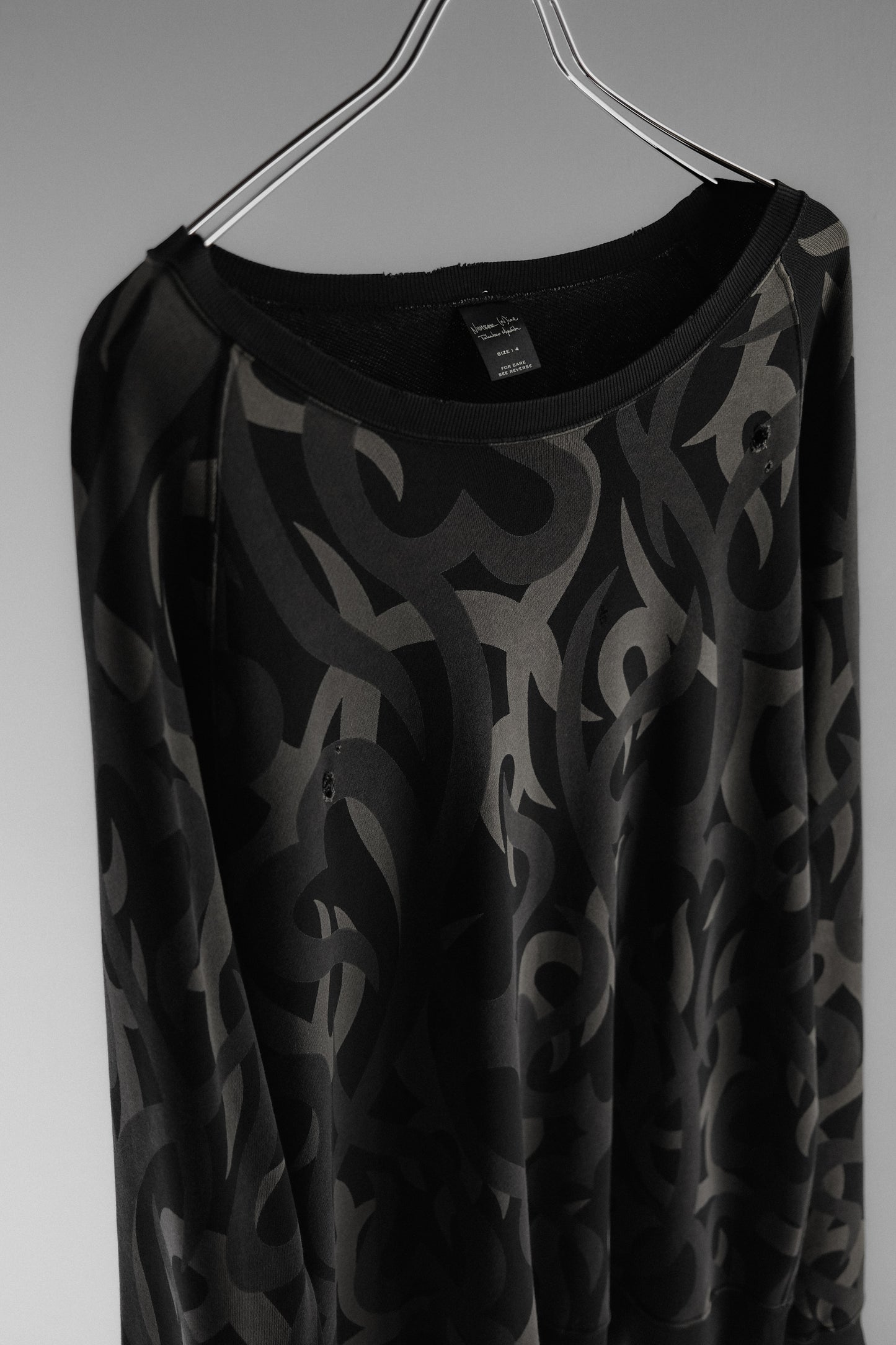 Number (N)ine F/W2004 “Give Peace a Chance” - Tribal Heart Camo Sweatshirt